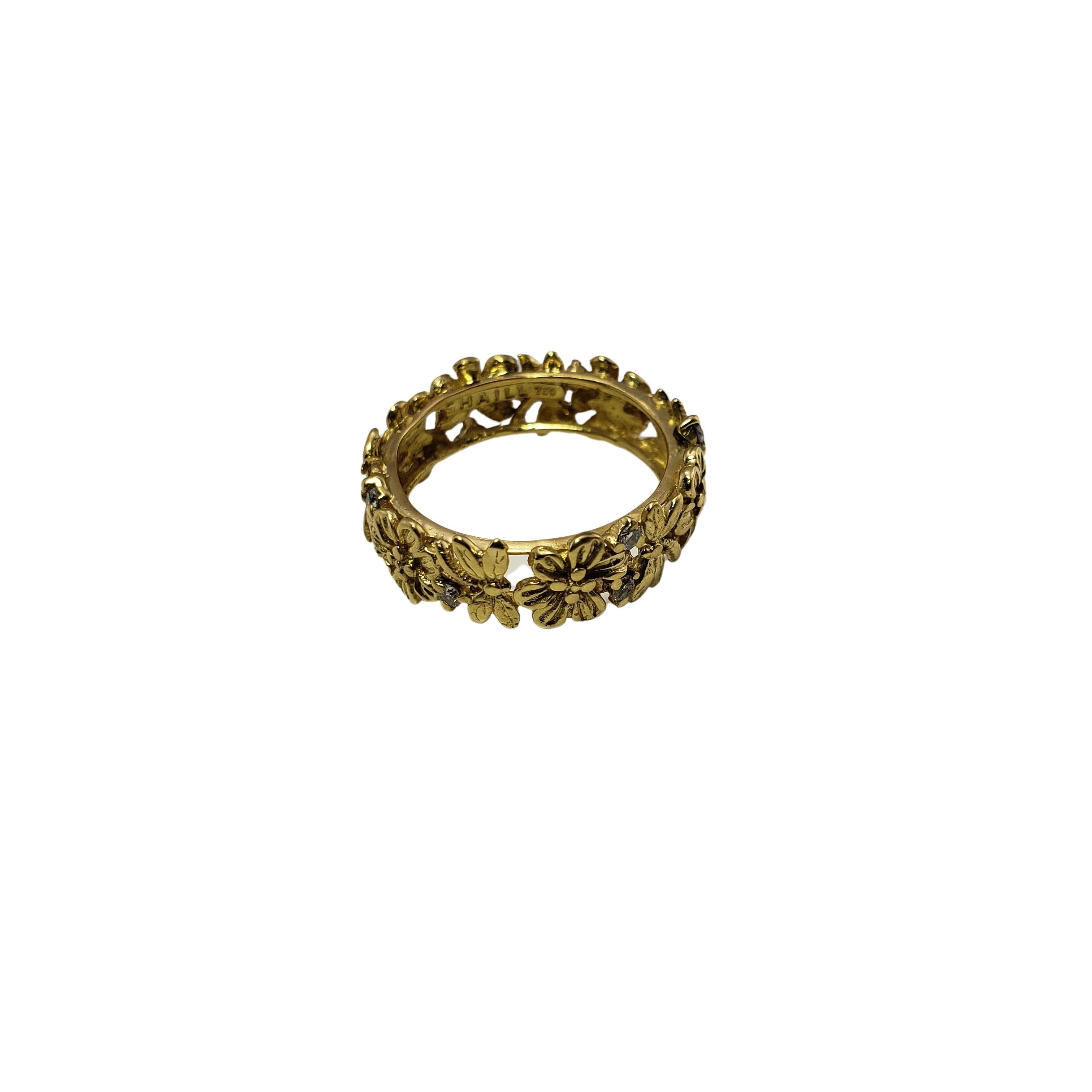 Vintage 18 Karat Yellow Gold and Diamond Floral Band Ring Size 5.75-

This lovely band features beautifully detailed flowers and dragonflies accented with 11 round brilliant cut diamonds. Width: 7 mm.

Approximate total diamond weight: .11