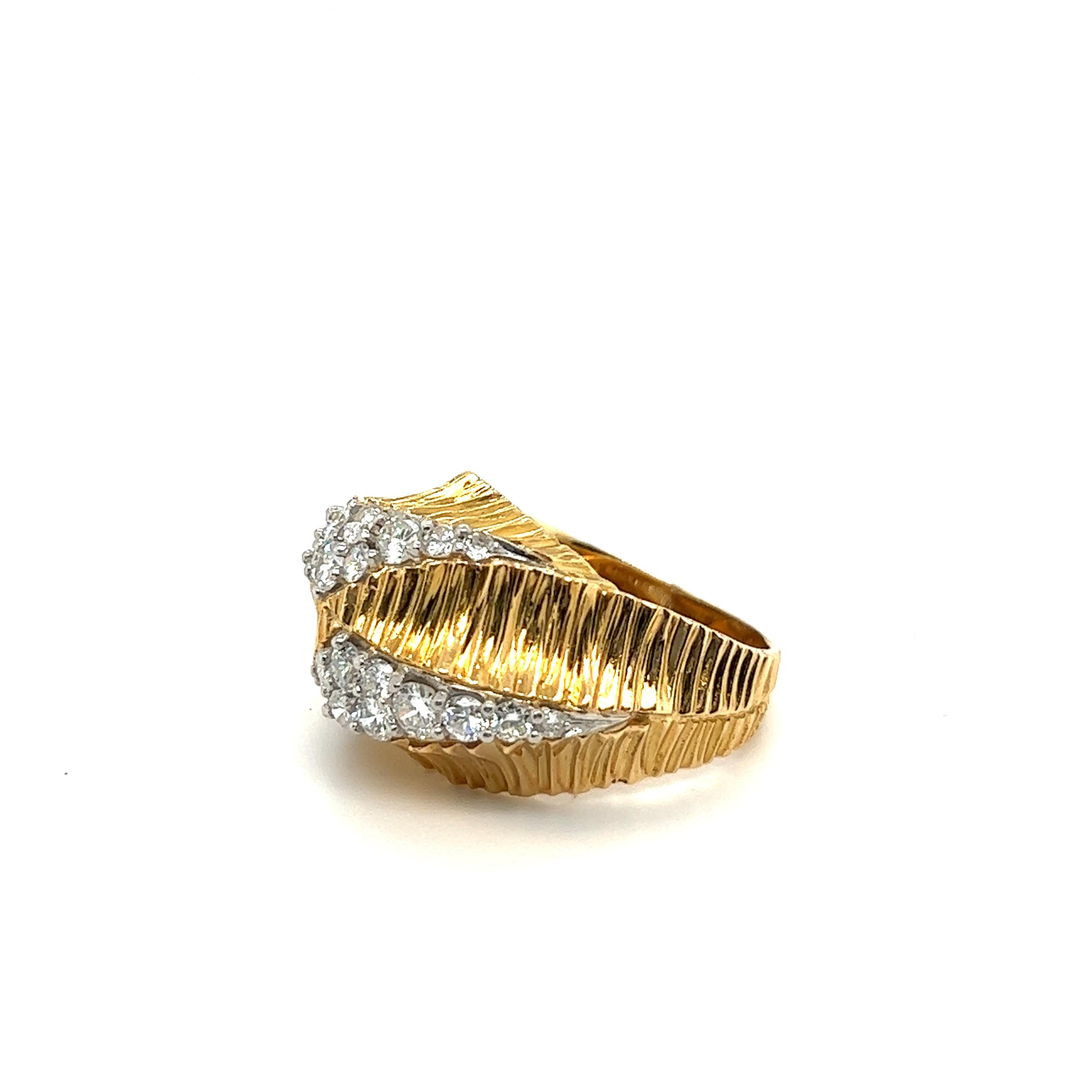 Architectural 18 karat yellow gold and diamond French cocktail ring, 1970s.
Asymetrically crafted in 18 karat yellow gold, this eye-catching ring is set with brilliant-cut diamonds totalling approximately 1.5 carats. The finely structured appearance