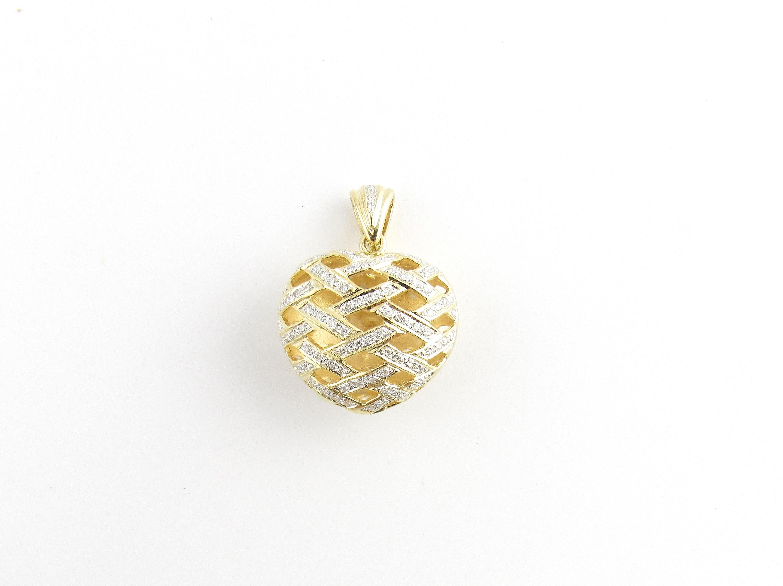 Vintage 18 Karat Yellow Gold and Diamond Heart Pendant

This stunning puffed heart pendant is decorated with 84 round brilliant cut diamonds set in classic 18K yellow gold.

Approximate total diamond weight: .42 ct.

Diamond color: G. Diamond