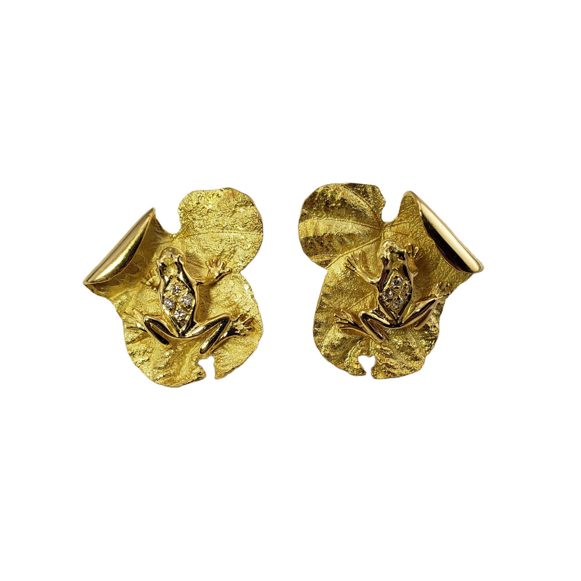 Vintage 18 Karat Yellow Gold and Diamond Lily Pad with Frog Earrings-

These lovely earrings each feature a frog sitting atop its lily pad. Accented with four round brilliant cut diamonds set in beautifully detailed 18K yellow gold. Omega back