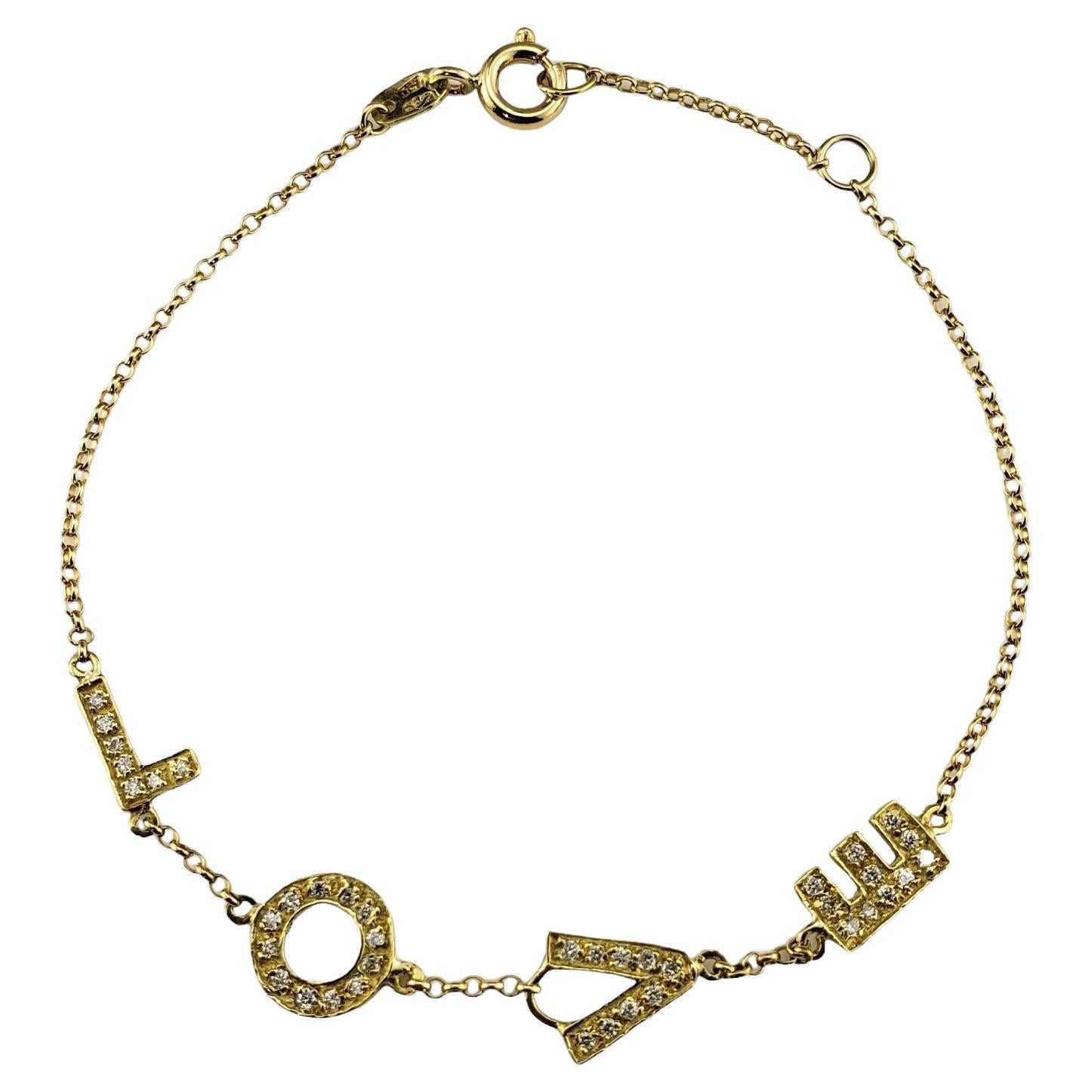 18 Karat Yellow Gold and Diamond "LOVE" Bracelet #17096 For Sale
