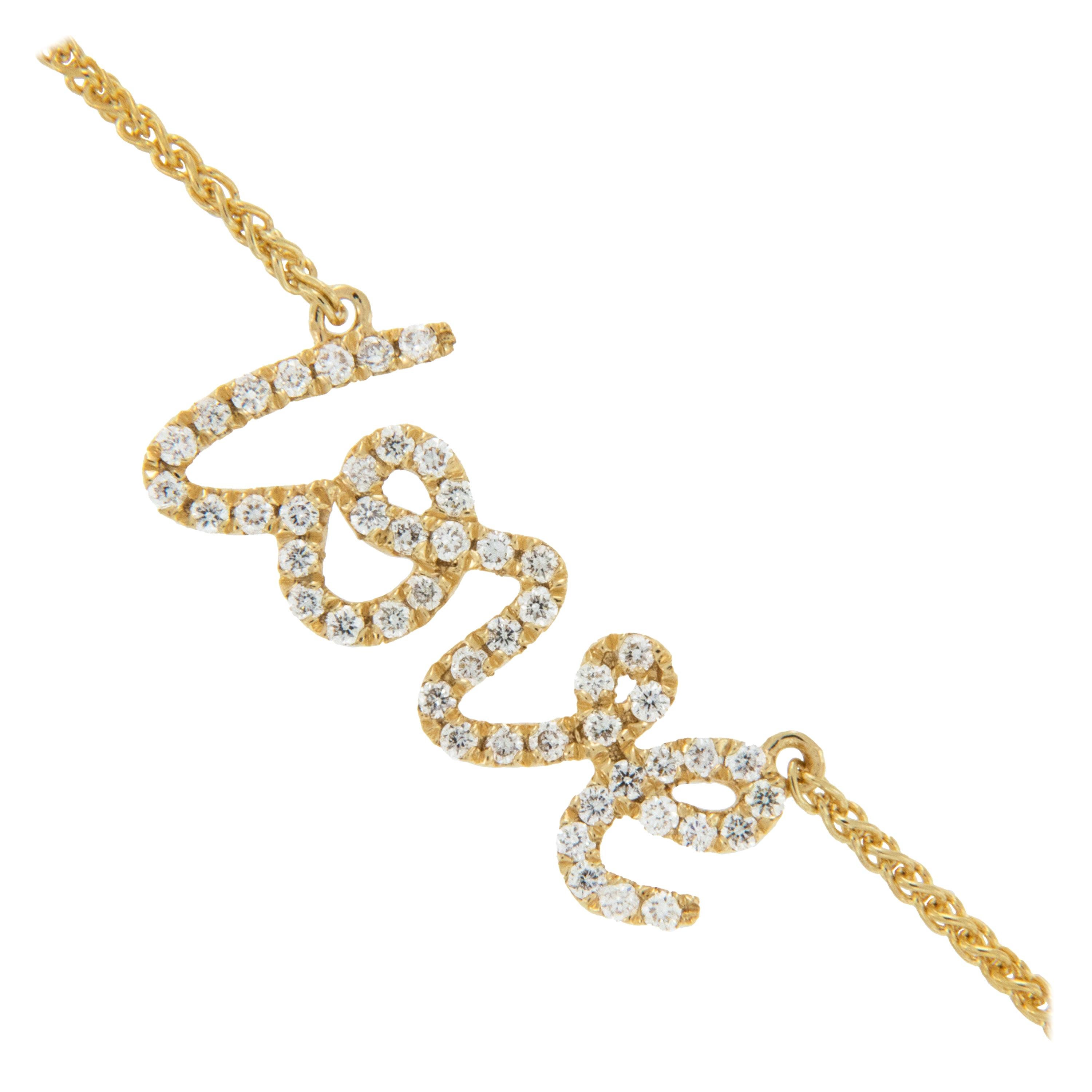 Valentines 18 Karat Yellow Gold and Diamond LOVE Necklace For Sale