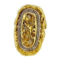 18 Karat Yellow Gold and Diamond Oblong Saddle Ring