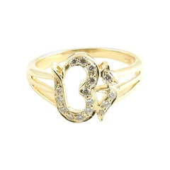 Bague symbole d'or jaune 18 carats et diamants en forme d'orme