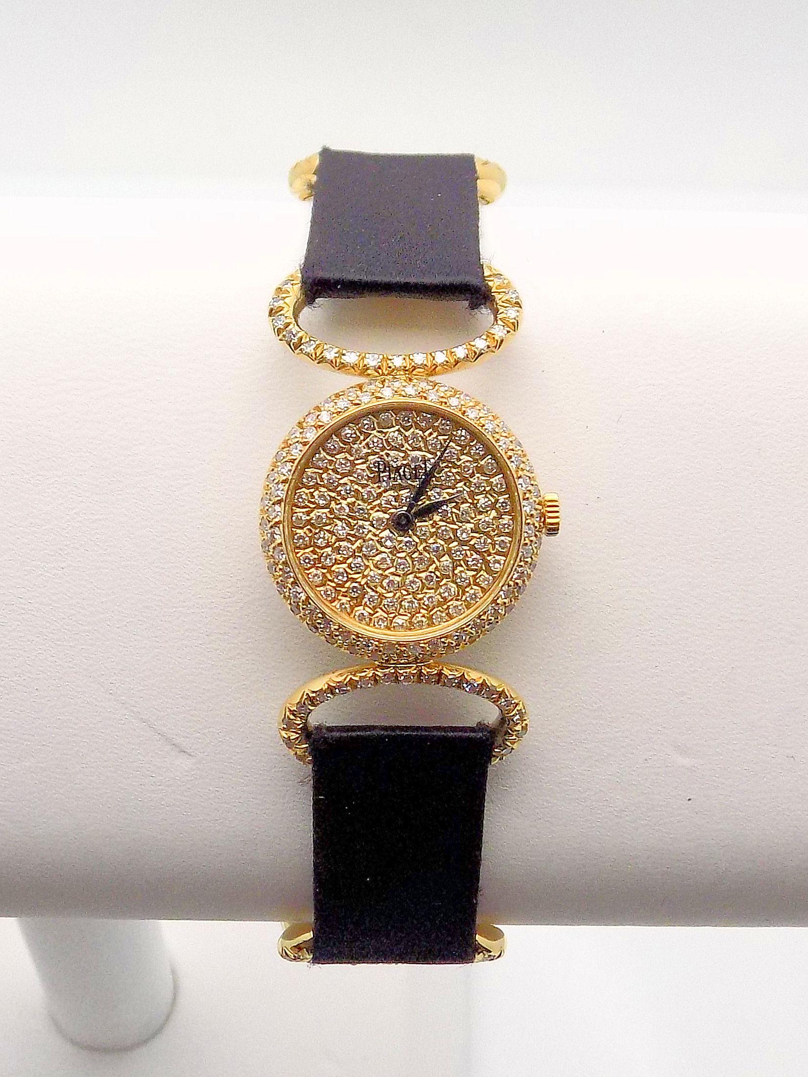 Stunning 18 Karat Yellow Gold Wristwatch by Piaget featuring a Diamond and Satin Strap; Style Number 4125 DB. 284 Round Diamonds Approximately 2.00 Carat Total Weight, VVS-2, F-G.  Factory Service/Restoration By Piaget, Switzerland, 12-2018.  Serial