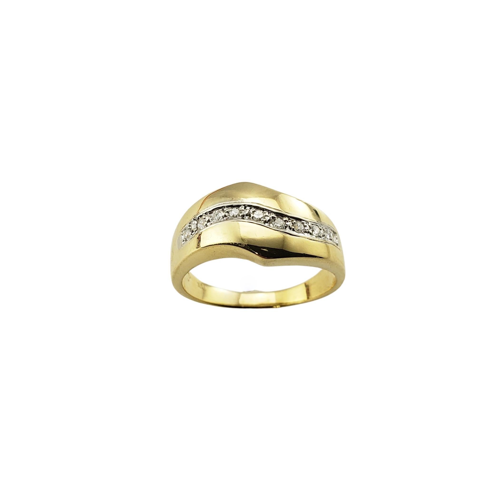 18K Yellow Gold and Diamond Ring Size 7.25-

This sparkling ring features ten round single cut diamonds set in classic 18K yellow gold.  Width: 10 mm.  Shank: 2 mm.

Approximate total diamond weight:  .10 ct.

Diamond color: G

Diamond clarity: