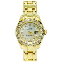 Retro 18 Karat Yellow Gold and Diamond Rolex 1995 Pearlmaster Mother of Pearl Dial