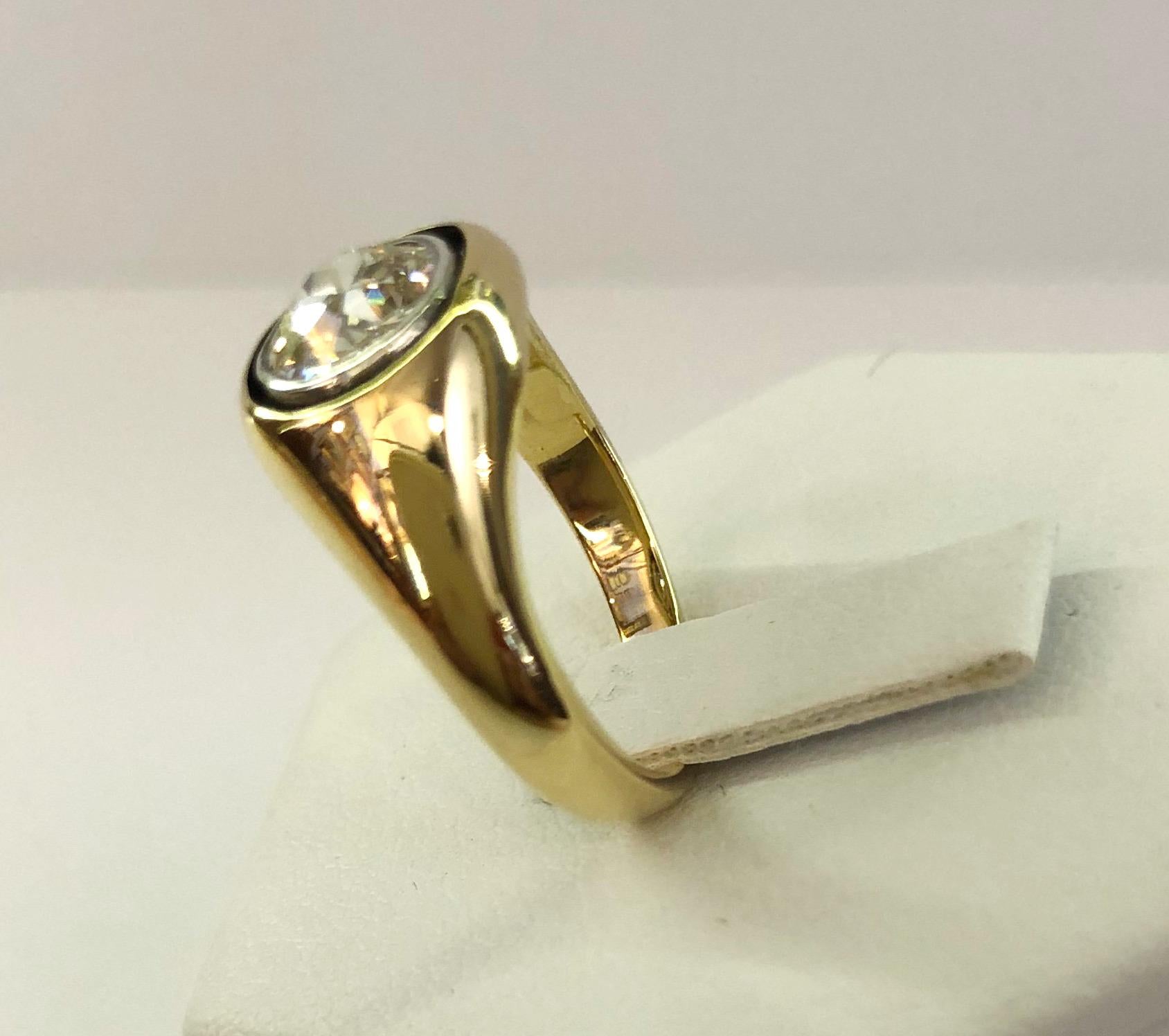 Women's 18 Karat Yellow Gold and Diamond Solitaire Ring
