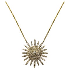Collana con ciondolo a forma di stella in oro giallo 18 carati e diamanti