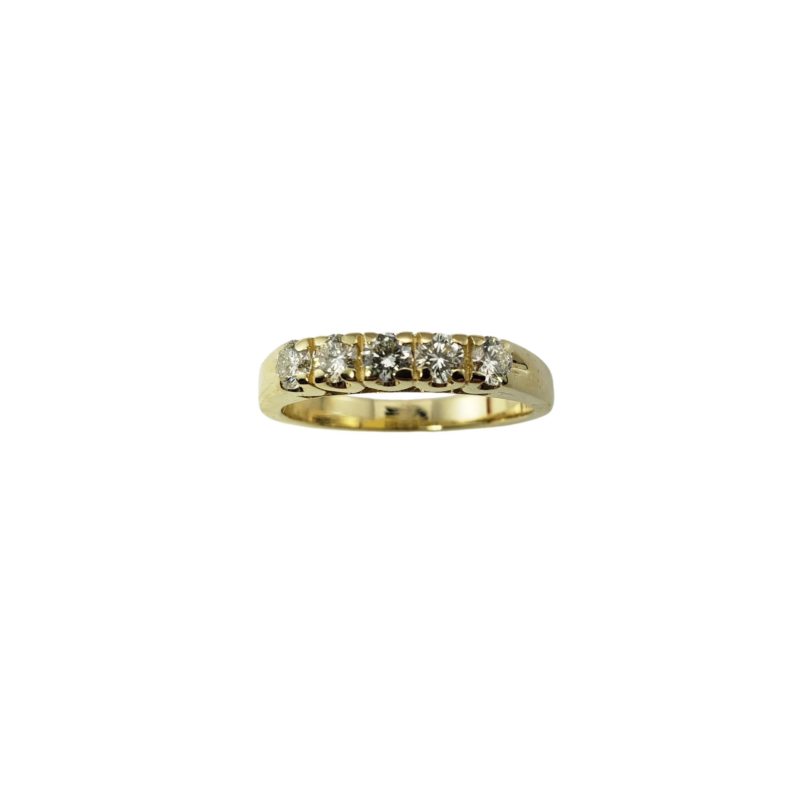 18 Karat Yellow Gold and Diamond Wedding Anniversary Band Ring Size 7-

This sparkling ring features five round brilliant cut diamonds set in classic 18K yellow gold.  Width:  3 mm.  Shank:  2.5 mm.

Approximate diamond weight:  .40 ct.

Diamond