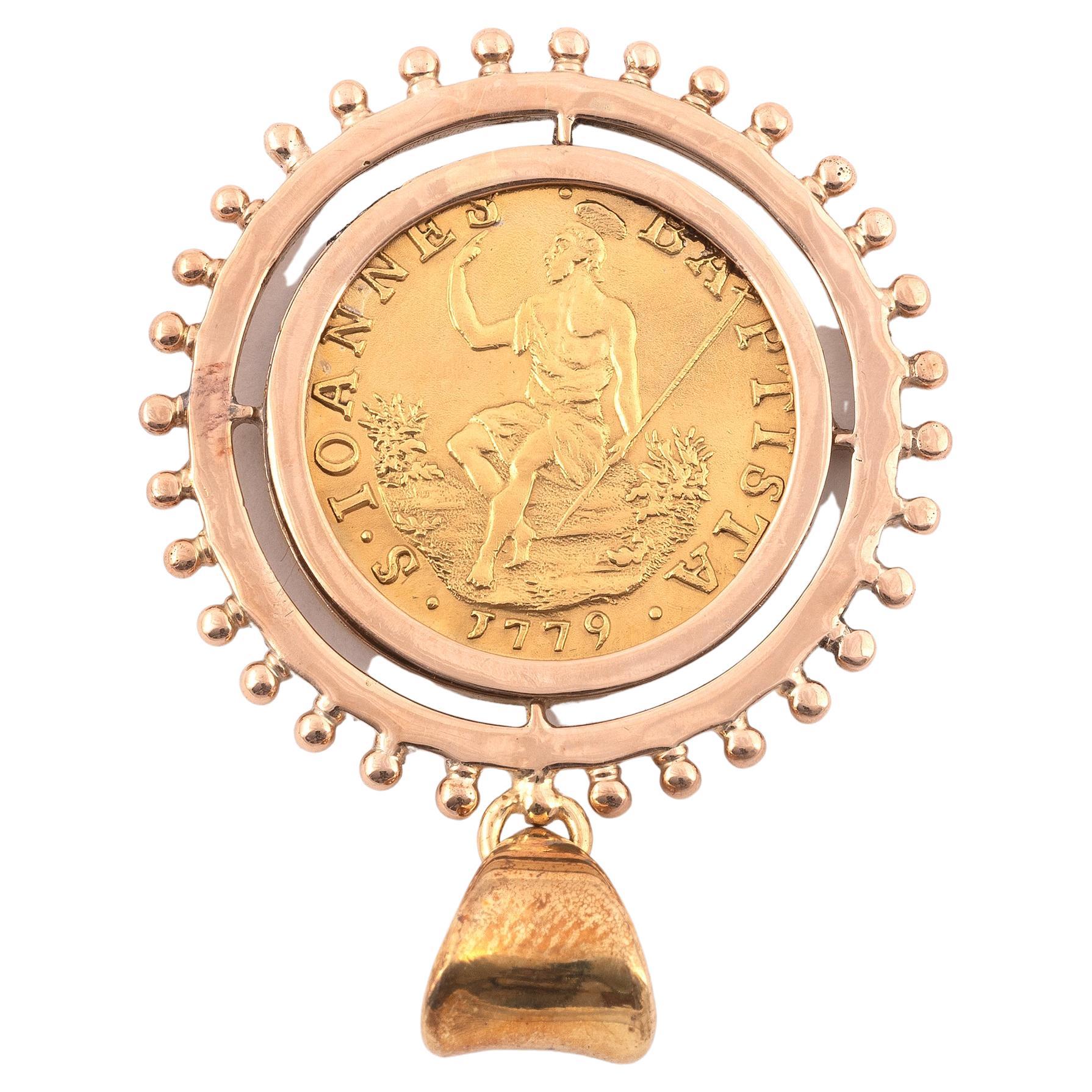 Pièce ancienne en or de Fiorino datée de 1779 avec le pendentif en or de la monture.
Diamètre : 3,2cm
Poids : 8.52gr.