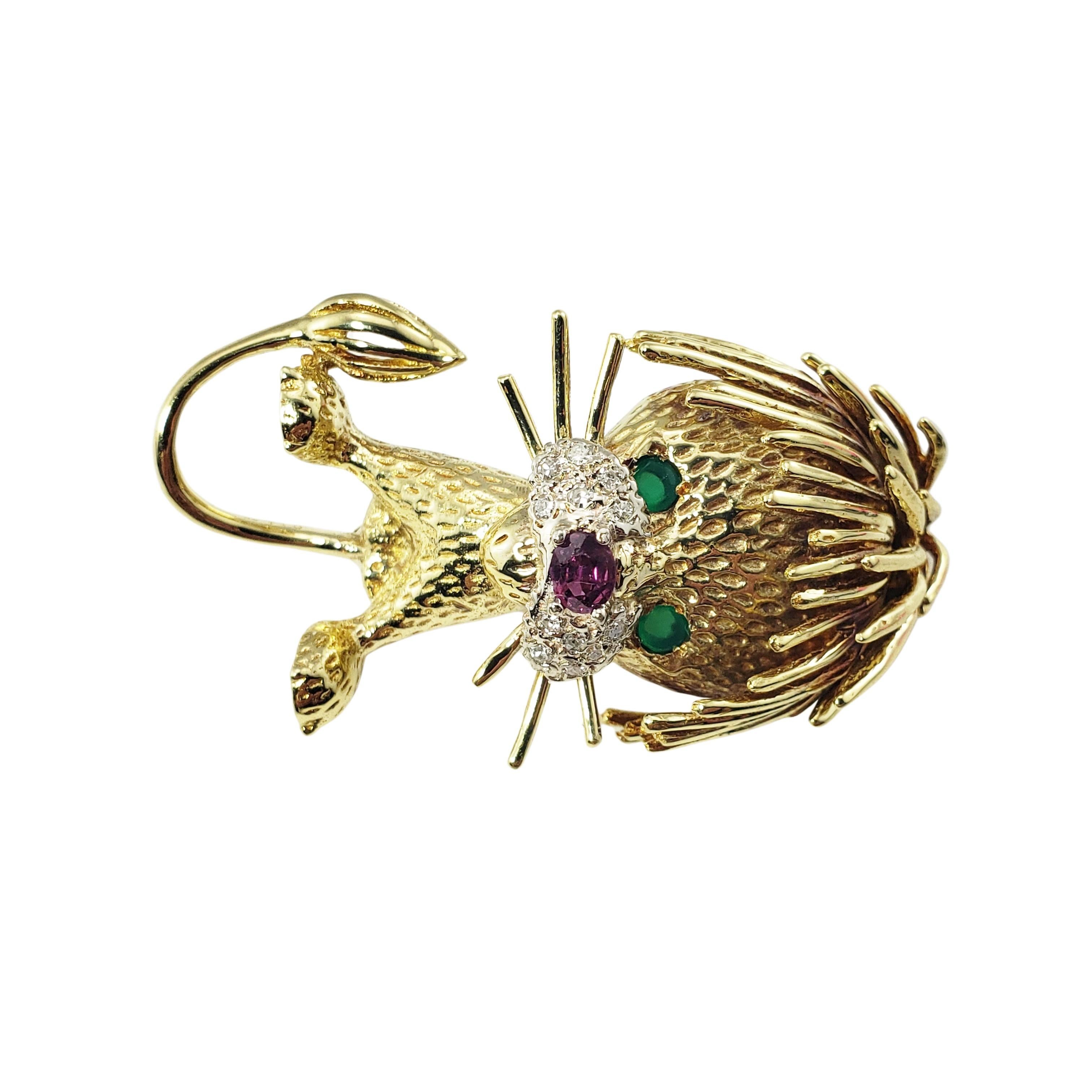 18 Karat Yellow Gold and Gemstone Lion Brooch/Pendant-

This stunning lion brooch is accented with two emeralds (eyes), one rhodolite (nose), and 12 round single cut diamonds set in beautifully detailed 18K yellow gold.

Approximate total diamond