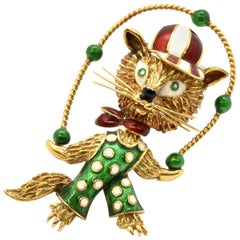 18 Karat Yellow Gold and Green, White, Red Enamel Juggling Cat Brooch Pin