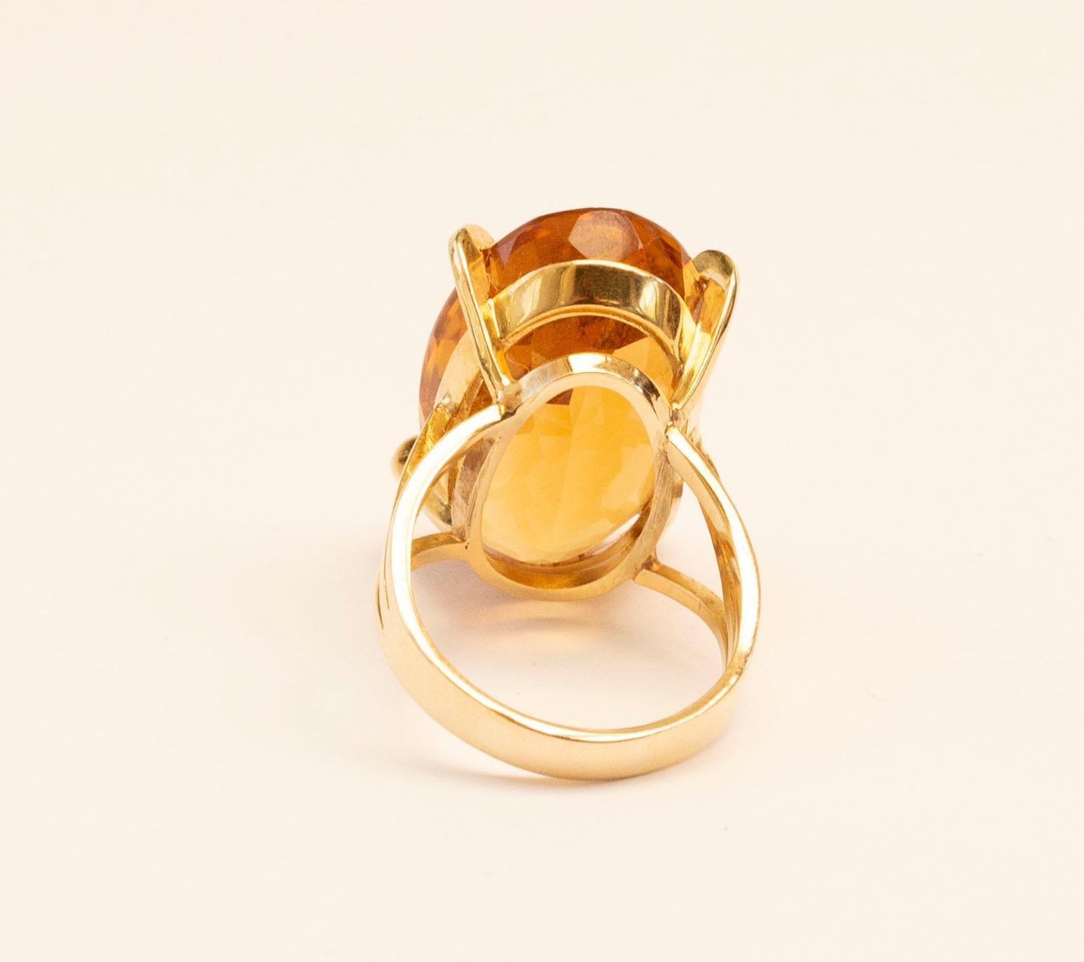 Contemporary 18 Karat Yellow Gold and Oval Brilliant Cut Citrine Cocktail Ring  For Sale