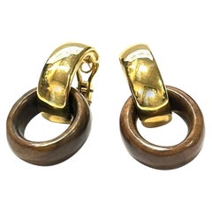 Boucles d'oreilles en or jaune 18 carats et palissandre