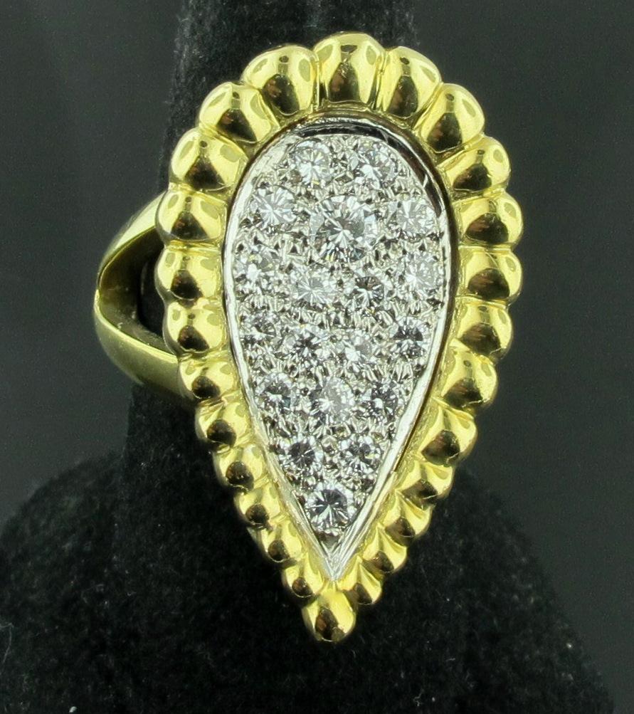 18 karat yellow gold ring with 19 round brilliant cut diamonds in a pear shape design. There is a total diamond weight of 1.75 carats.  Ring size is 8, can be sized. 