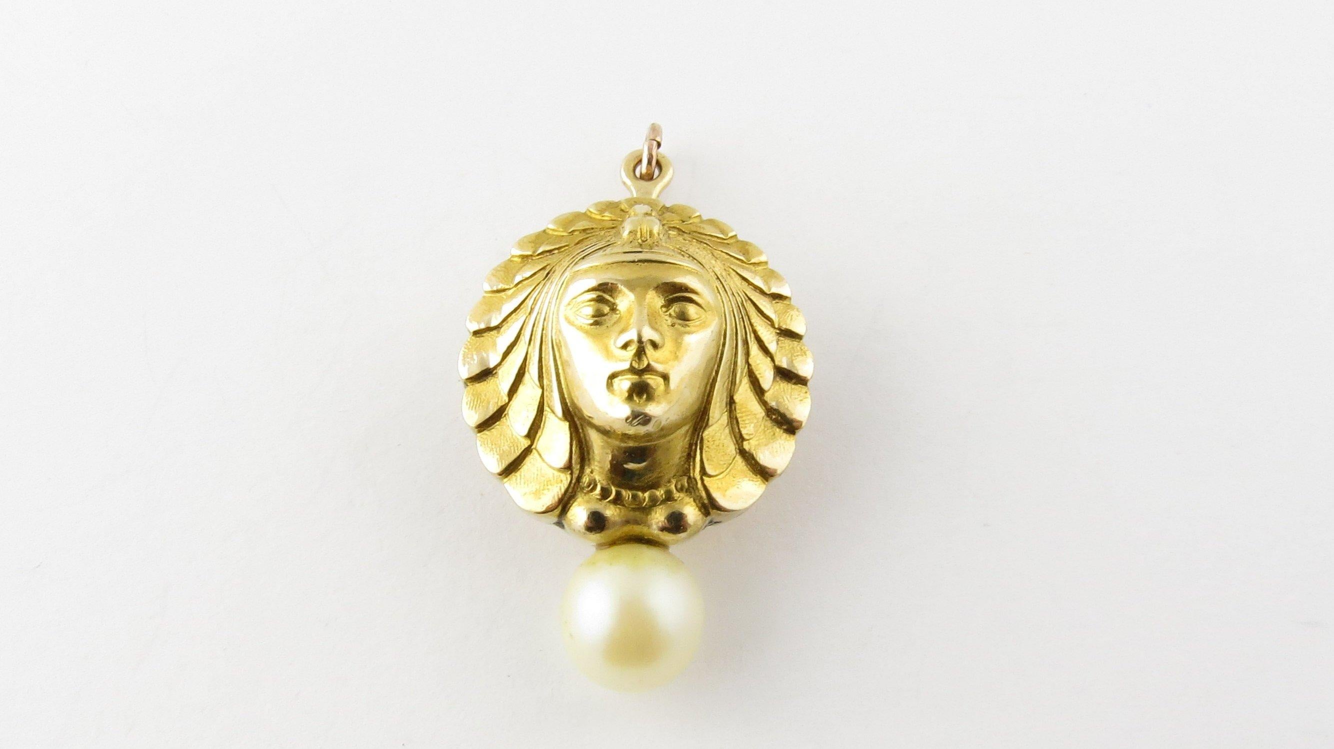 Vintage 18 Karat Yellow Gold and Pearl Goddess Pendant/Brooch- 
This regal piece features a stunning goddess accented with one 7 mm cultured pearl. Can be worn as a brooch or a pendant. Beautifully detailed in 18K yellow gold. 
Size: 32 mm x 19 mm