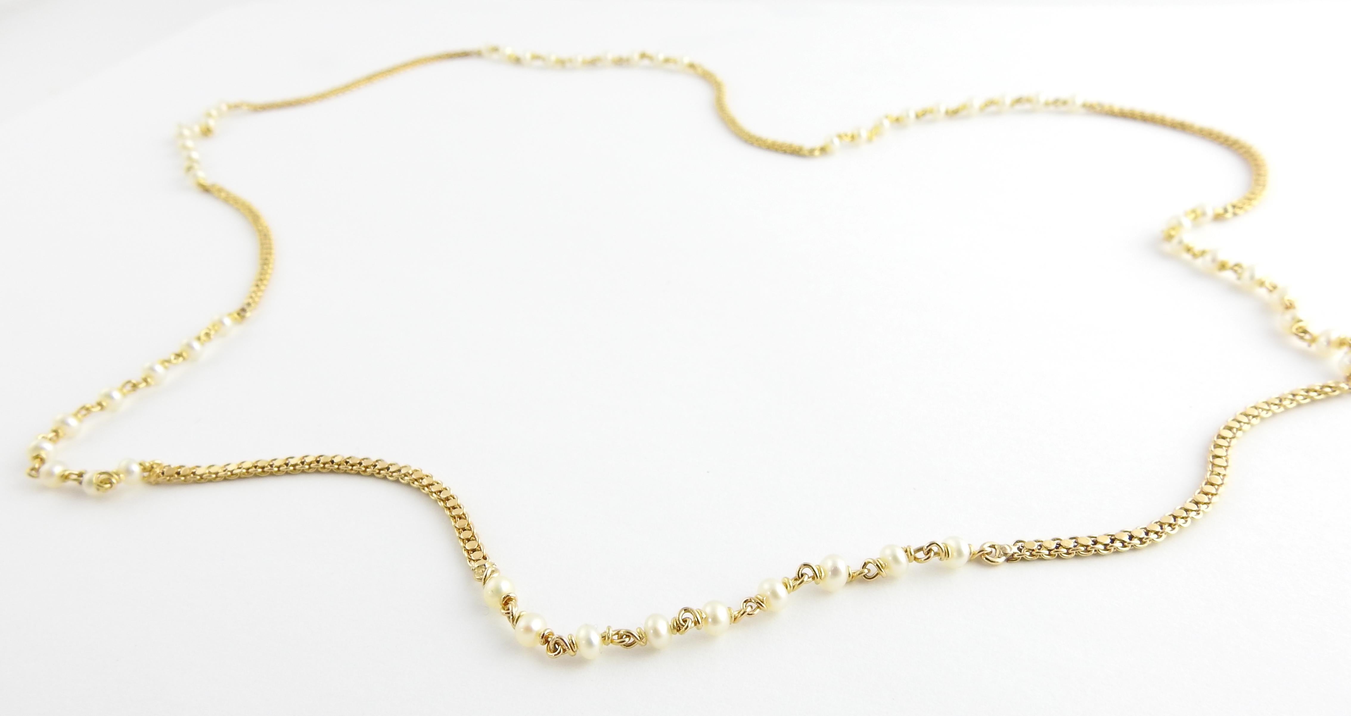 Vintage 18 Karat Yellow Gold and Pearl Necklace

This stunning necklace features 54 pearls  - 3 mm each - on an elegant 18K yellow gold chain.

Size: 18 inches

Weight: 8.0 dwt. / 12.5 gr.

Acid tested for 18K gold.

Very good condition,