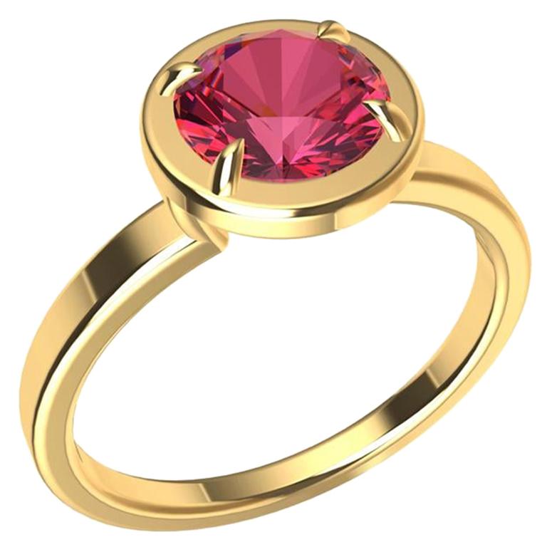 Bague en or jaune 18 carats et saphir rose