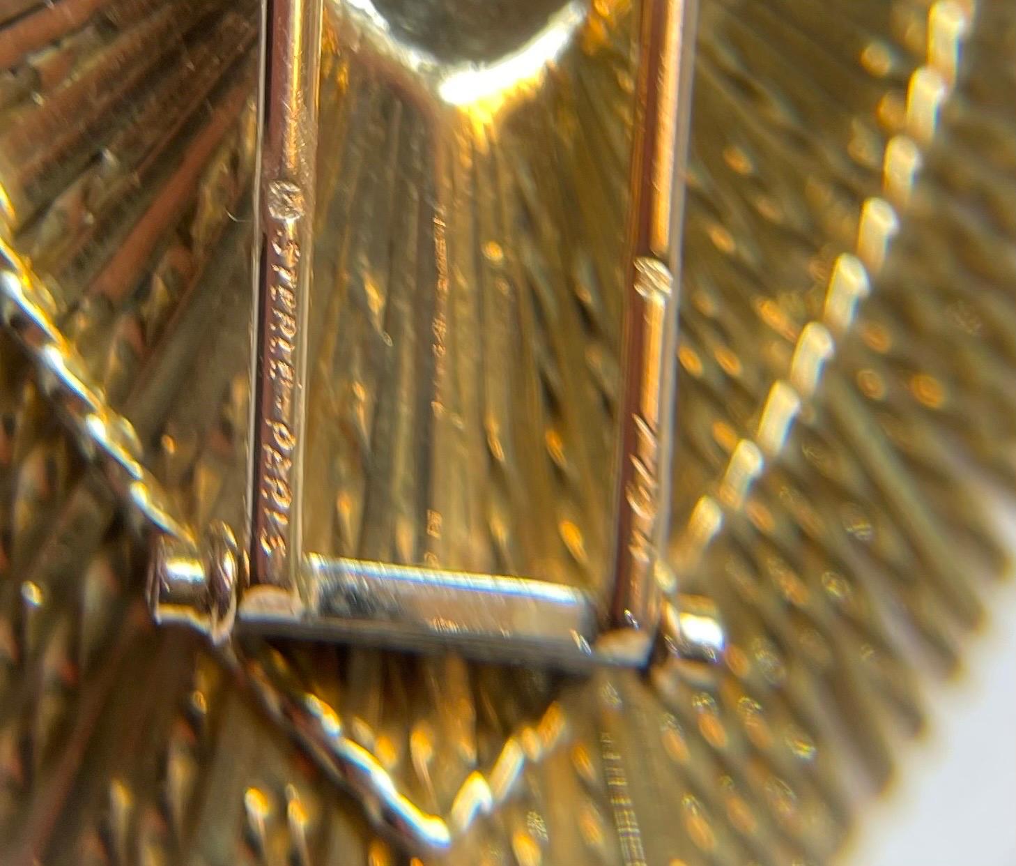 Broche de oro amarillo de 18 quilates y platino con rubíes y diamantes de Sterlé Paris en venta 4