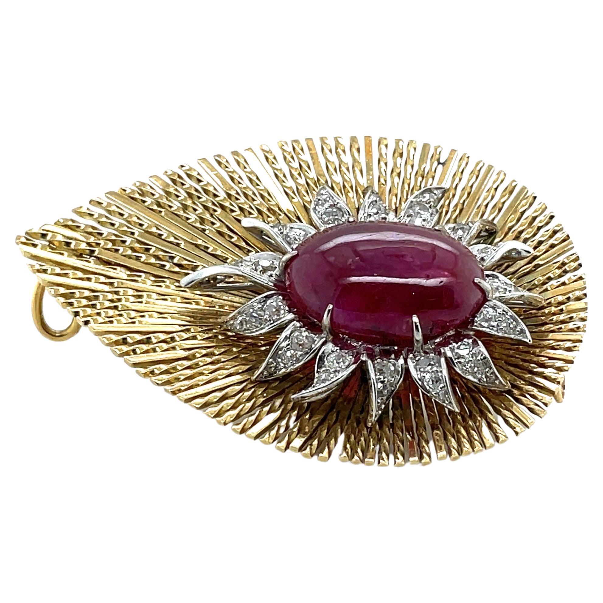 Ravishing 18 karat yellow gold, platinum, ruby and diamond brooch, by Sterlé, Paris, circa 1950s 

Delightful, drop-shaped clip brooch/pendant, composed of twisted and polished 18 karat gold wire, centering upon a stylised flower motif, set with 1