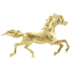 18 Karat Yellow Gold and Ruby Stallion Horse Brooch or Pin