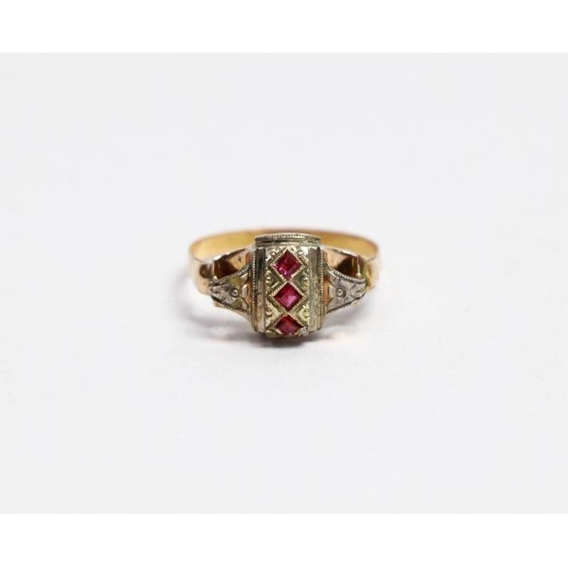 18 Karat Yellow Gold and Silver Ring with 3 Rubies

- Materials & Techniques: Yellow Gold, 833 Silver and Rubies
- Date the piece was created: 1938-1985
- Dimensions: Measure 19
- Weight: 2.8 grams (0.10 oz)
- Origin: Portugal
- Hallmarks of all
