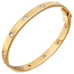 18 Karat Yellow Gold and Ten Diamond Hinged Bangle