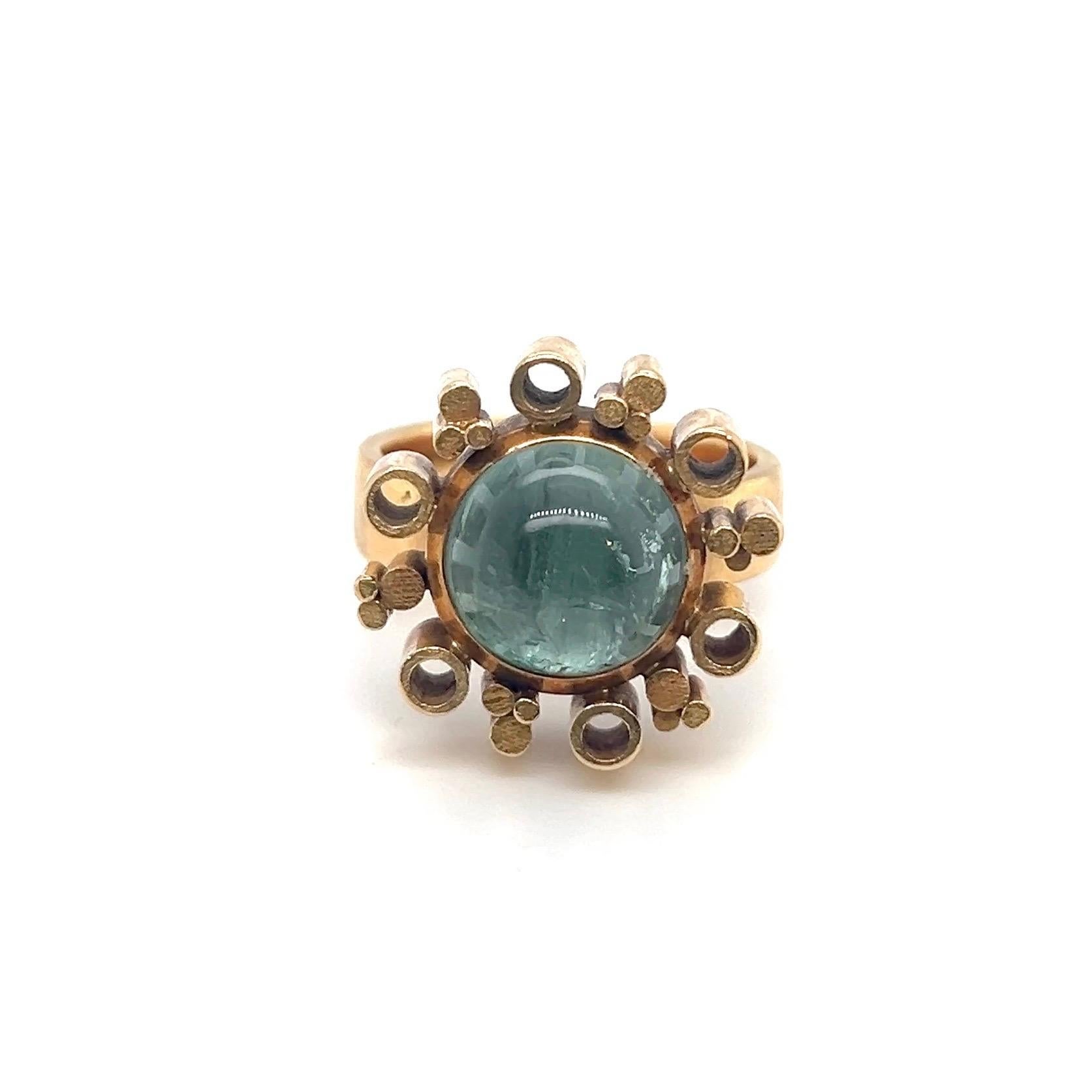 Femenino o masculino Anillo de cóctel modernista de oro amarillo de 18 quilates y turmalina, años 70