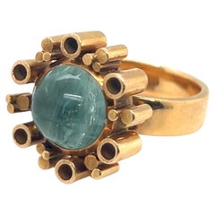 Anillo de cóctel modernista de oro amarillo de 18 quilates y turmalina, años 70