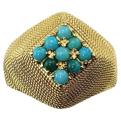 Anello in oro giallo 18 carati e turchese