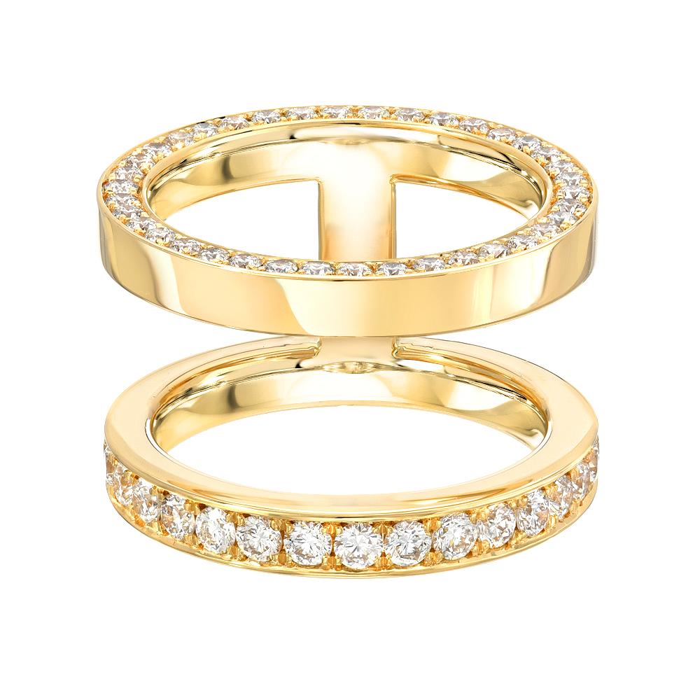 The Doublet Ring features two unique bands connected with a bar that can be worn in the front or the back.  It is 18k gold with 1.76 ct of white diamonds.  One of the connected rings has stones set all around the face of the shank, and the other