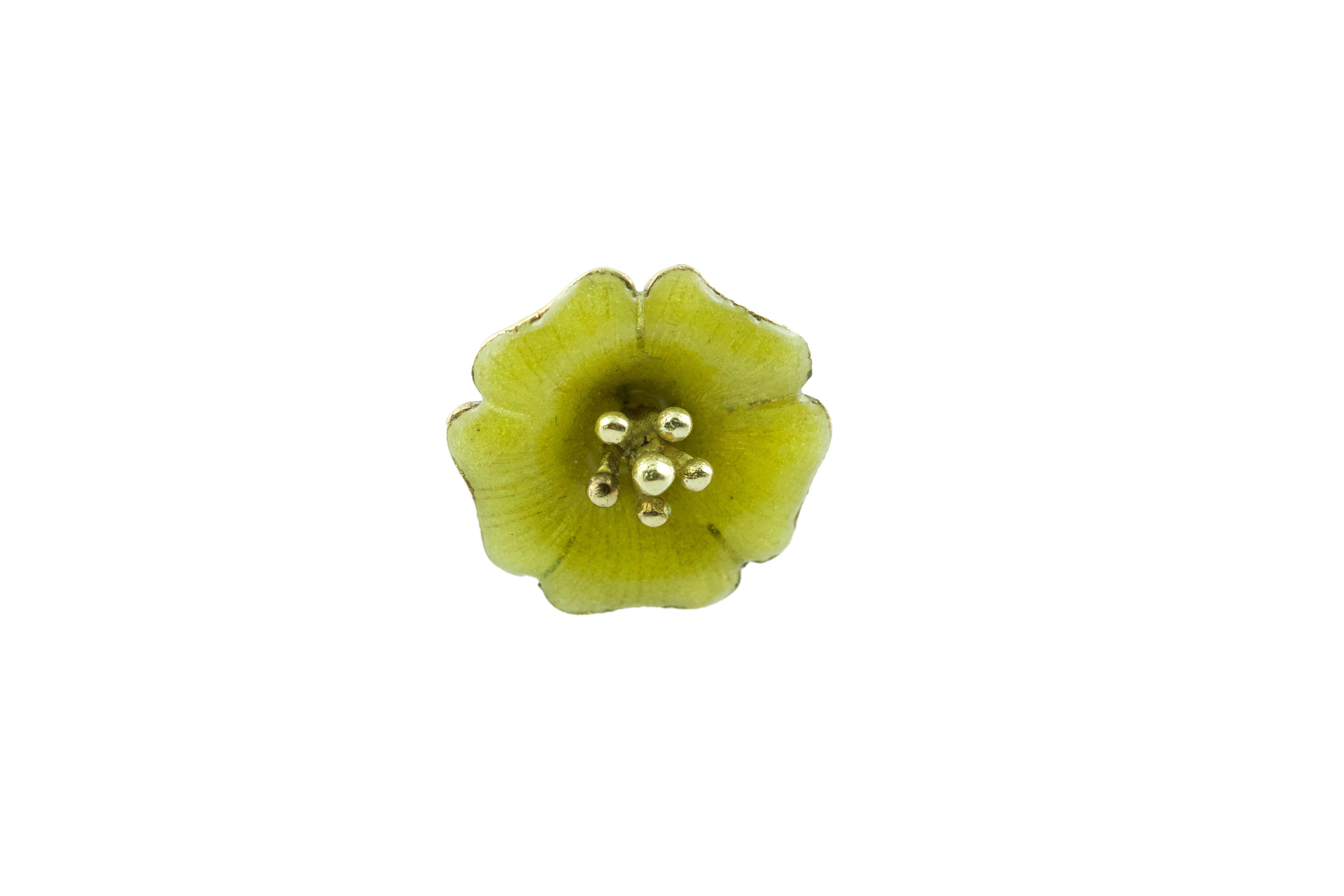 Amazing brooches designed as a flower each enameled with different colors.
18k gold.