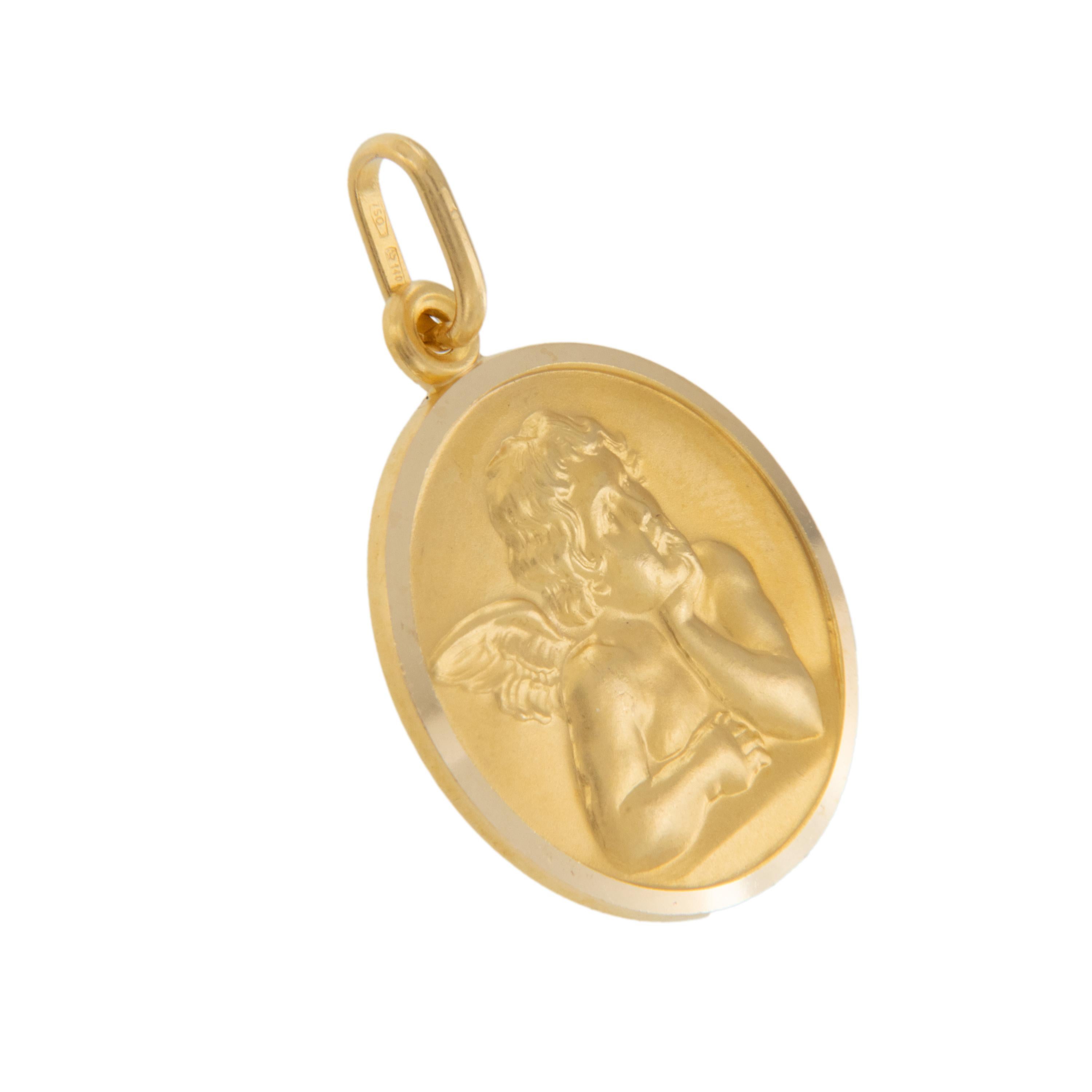 This beautifully detailed cherub angel medal is made from rich 18 karat yellow gold. Handcrafted in Italy, medal measures 1
