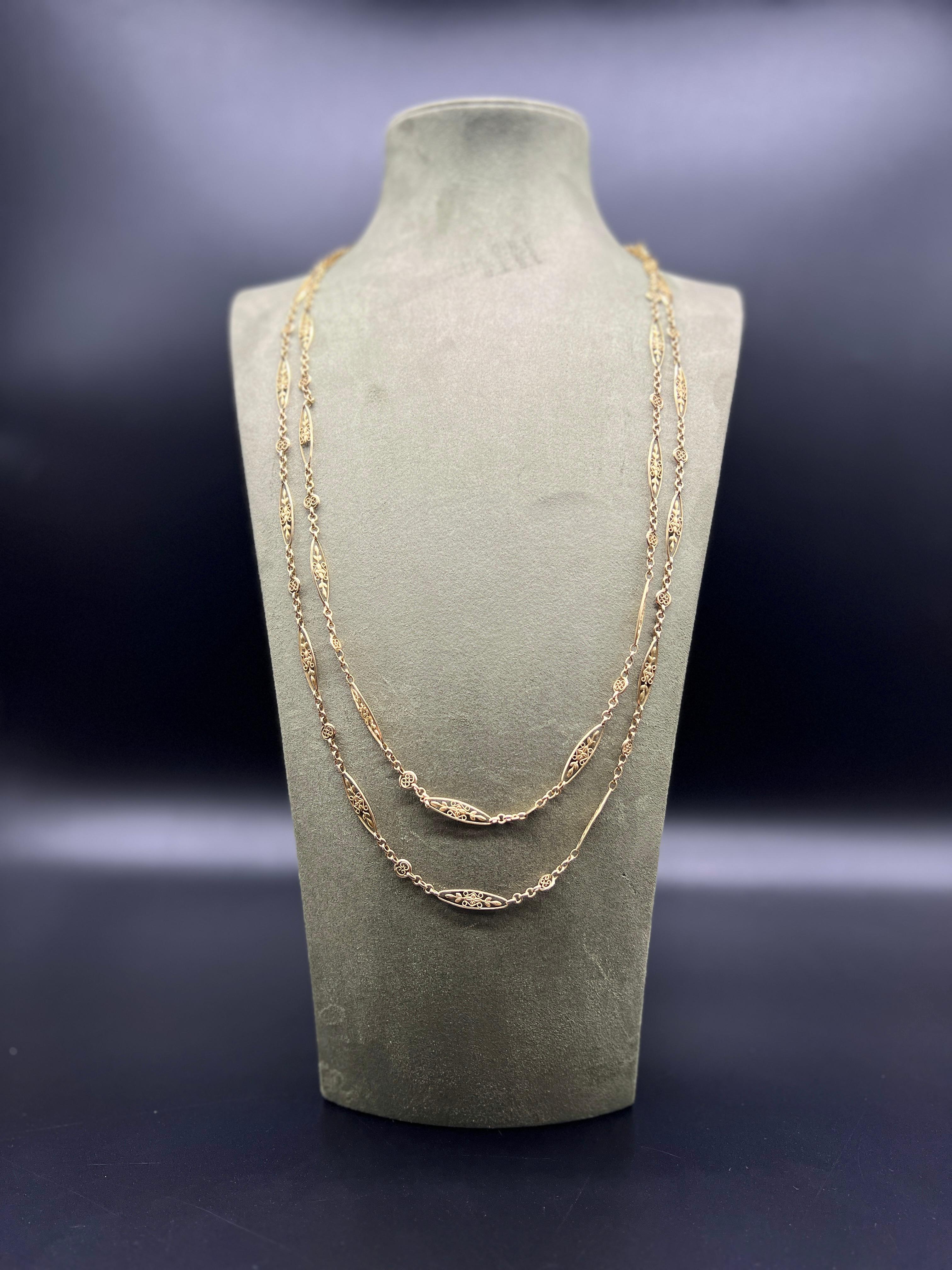 Discover this antique 18k yellow gold link chain, for women looking for an exceptional piece of jewellery. Measuring 148cm in total length and 74cm when closed, this chain offers an elegant and striking presence around the neck.

Its round spring