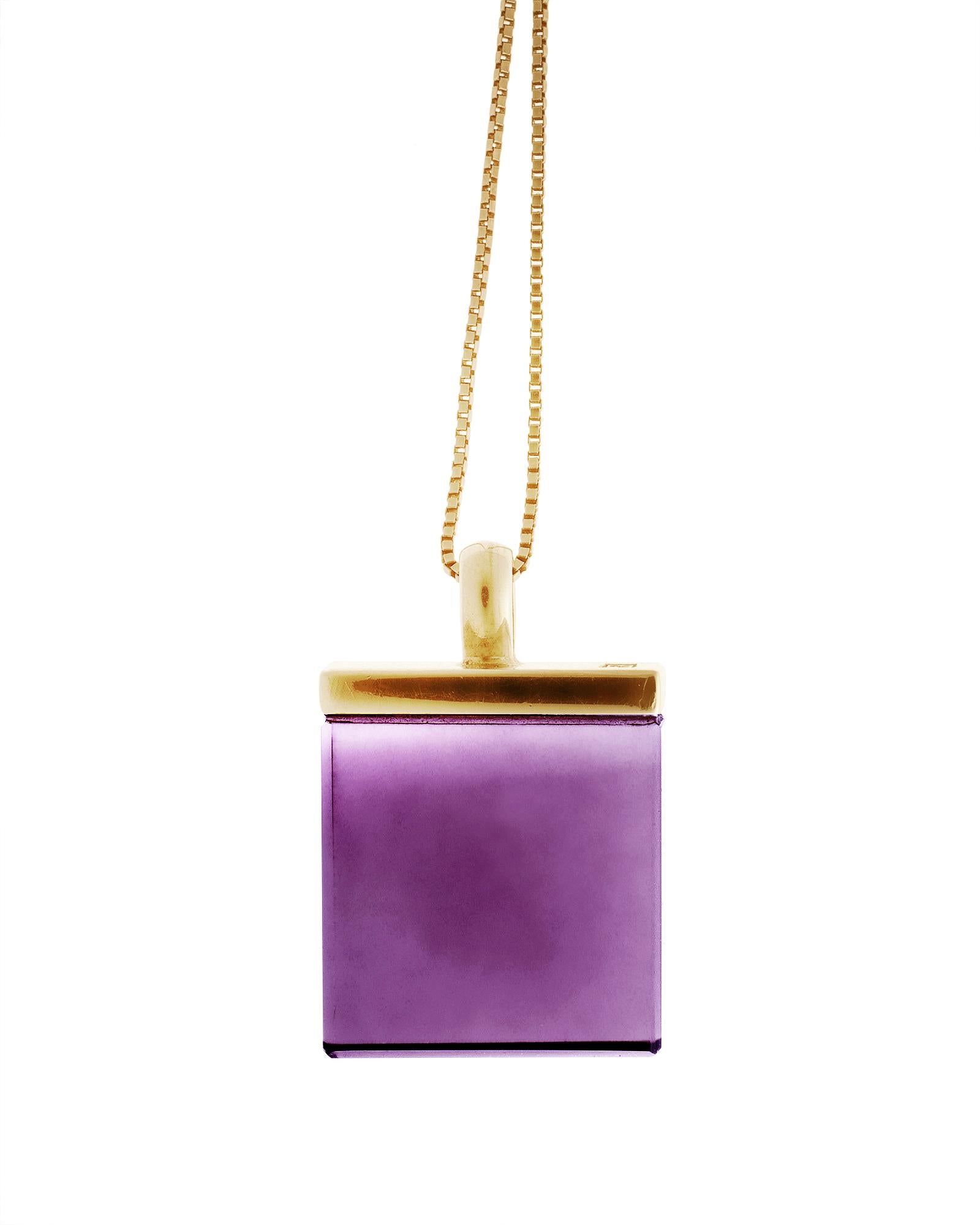 This 18 Karat Yellow Gold pendant necklace features a large 15x15x8 mm vivid grown amethyst (or lighter rose natural amethyst), specially cut for the artist. It is part of the Ink collection, which has been featured in publications such as Harper's