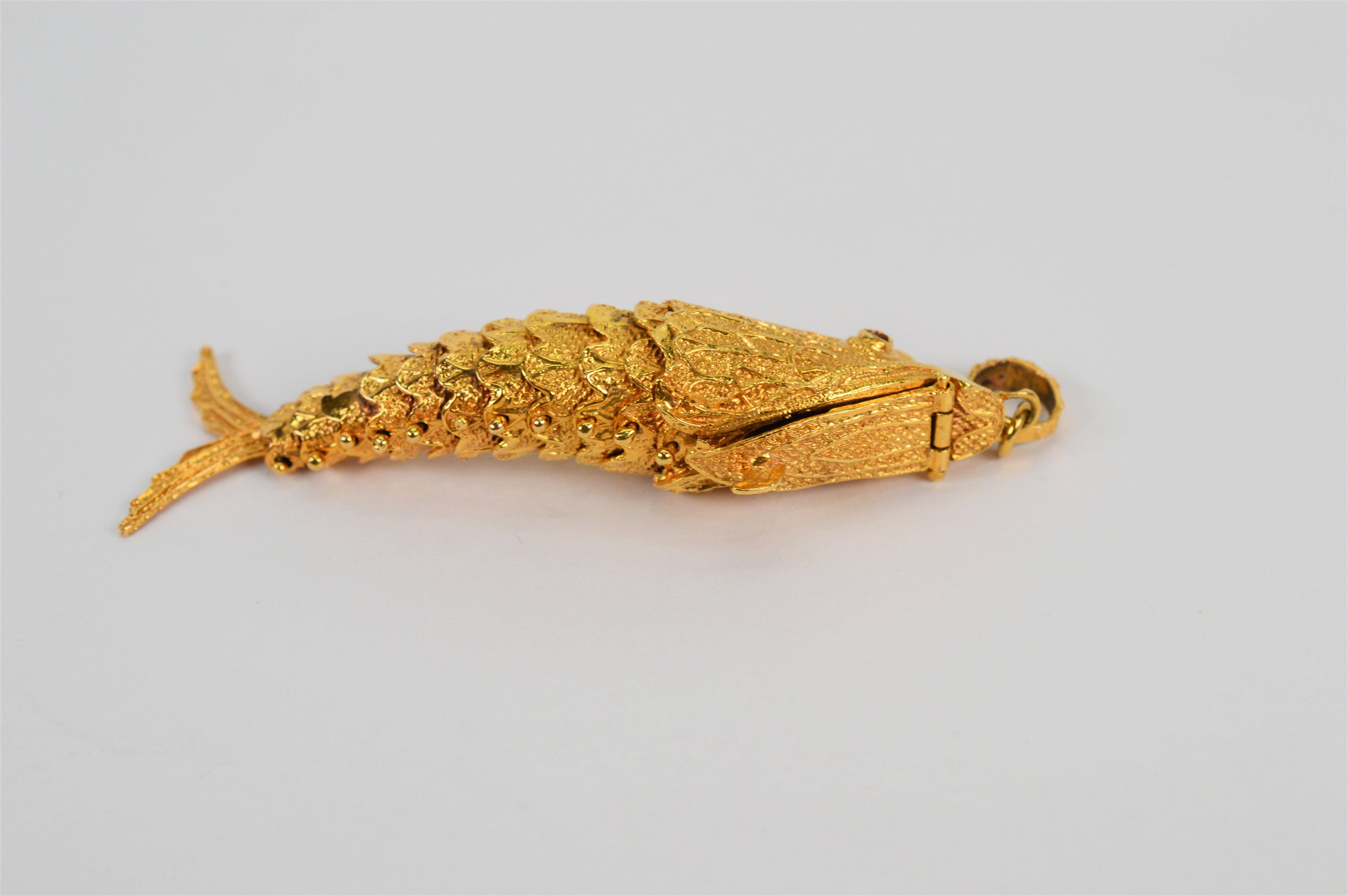 Round Cut 18 Karat Yellow Gold Articulated Fish Pendant w Ruby Eyes and Hidden Compartment For Sale