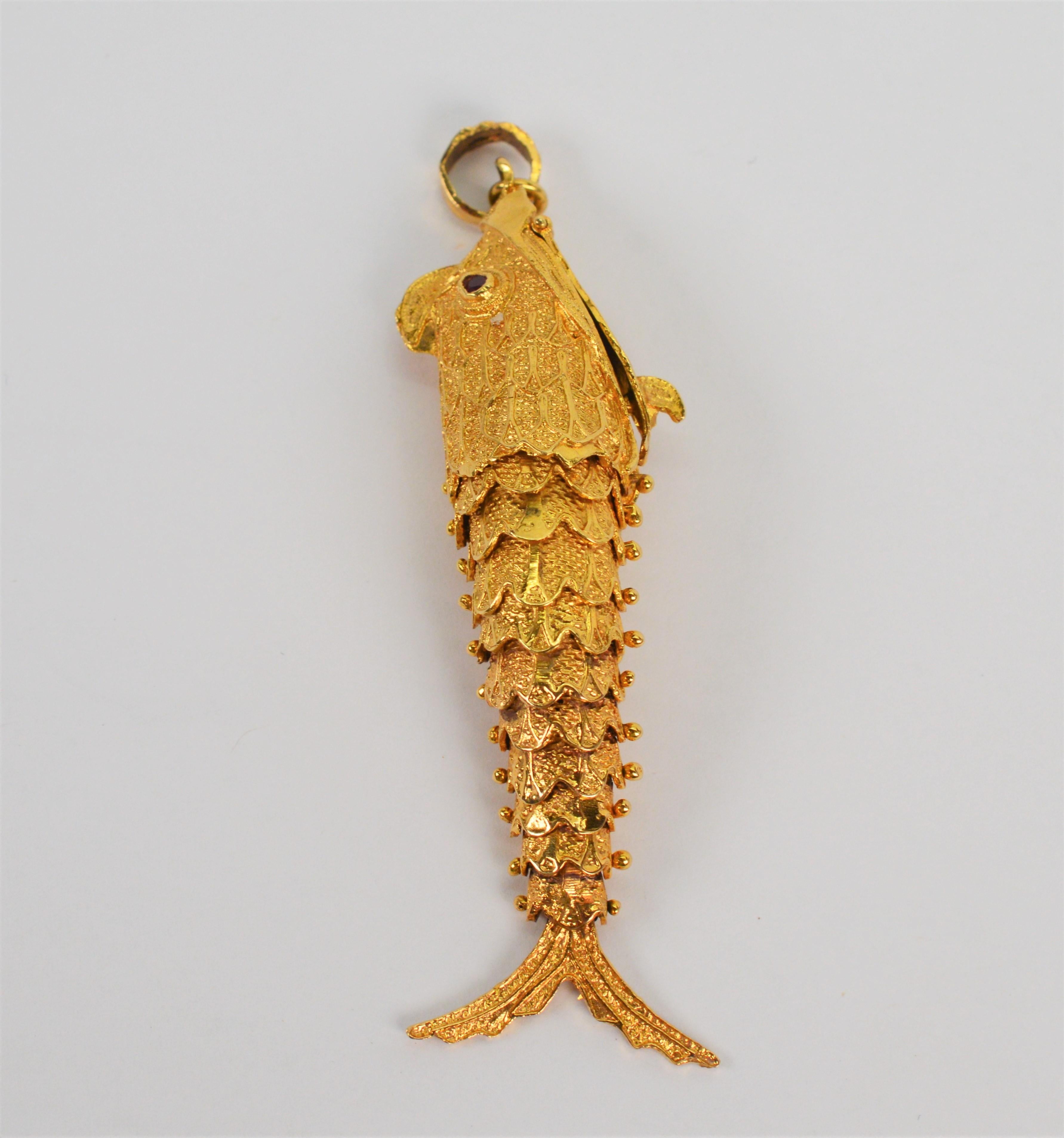 18 Karat Yellow Gold Articulated Fish Pendant w Ruby Eyes and Hidden Compartment In Excellent Condition For Sale In Mount Kisco, NY