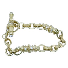 18 Karat Yellow Gold Articulated Sectional Diamond Cable Link Bracelet