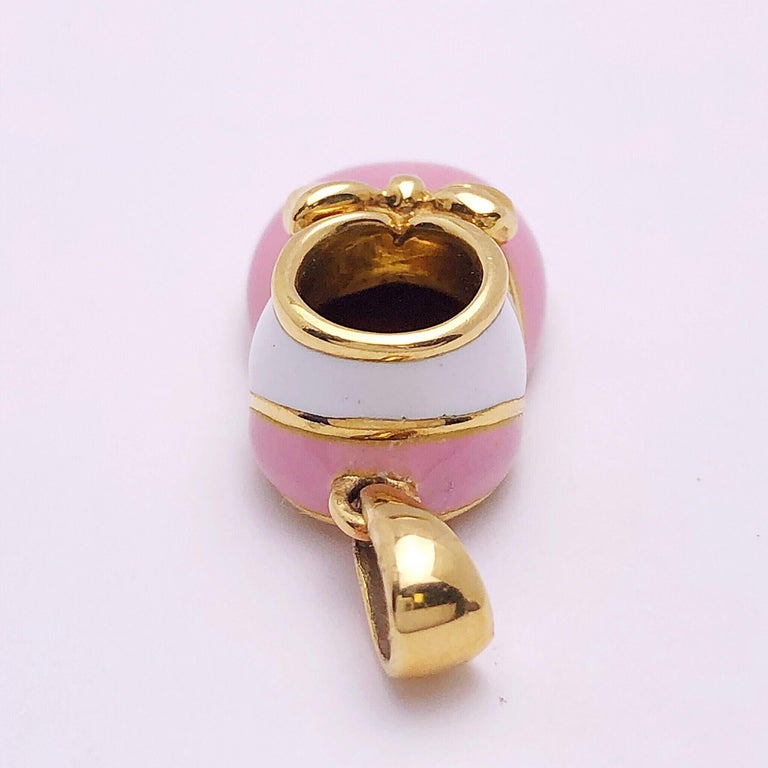 18 Karat Yellow Gold Baby Shoe Charm with Pink and White Enamel at