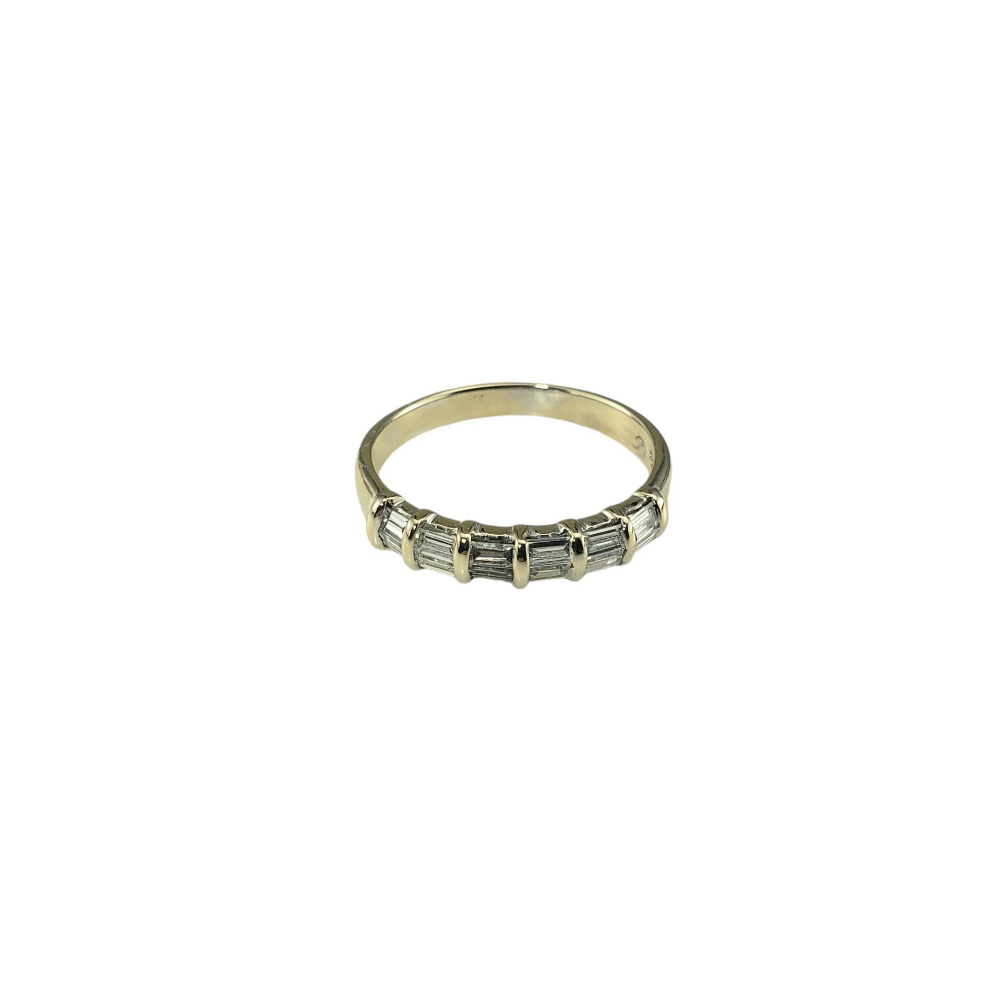 18 Karat Yellow Gold and Baguette Diamond Wedding Band Ring Size 6.5

This sparkling band features 12 baguette cut diamonds set in classic 18K yellow gold.

Width: 3 mm.
Shank: 2.5 mm.

Approximate total diamond weight: .20 ct. - .24 ct.

Diamond