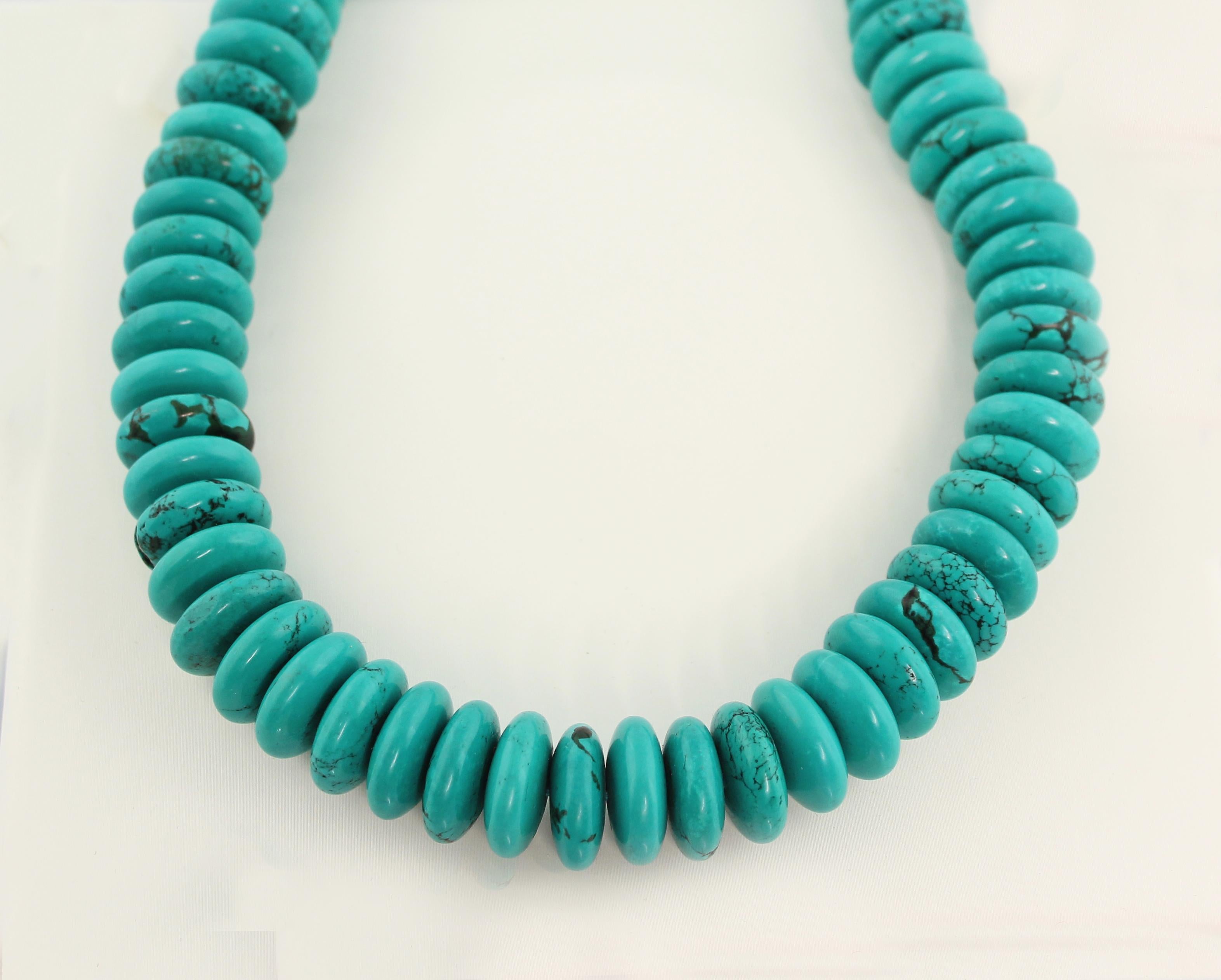 This incredible turquoise bead necklace with a beautiful 18 karat yellow gold clasp embellished by sapphires cut baguette. 

Length:
            52 cm circa/  20,50 inches circa

Weight: 
            190 gr circa 

All AVGVSTA jewelry is new and has