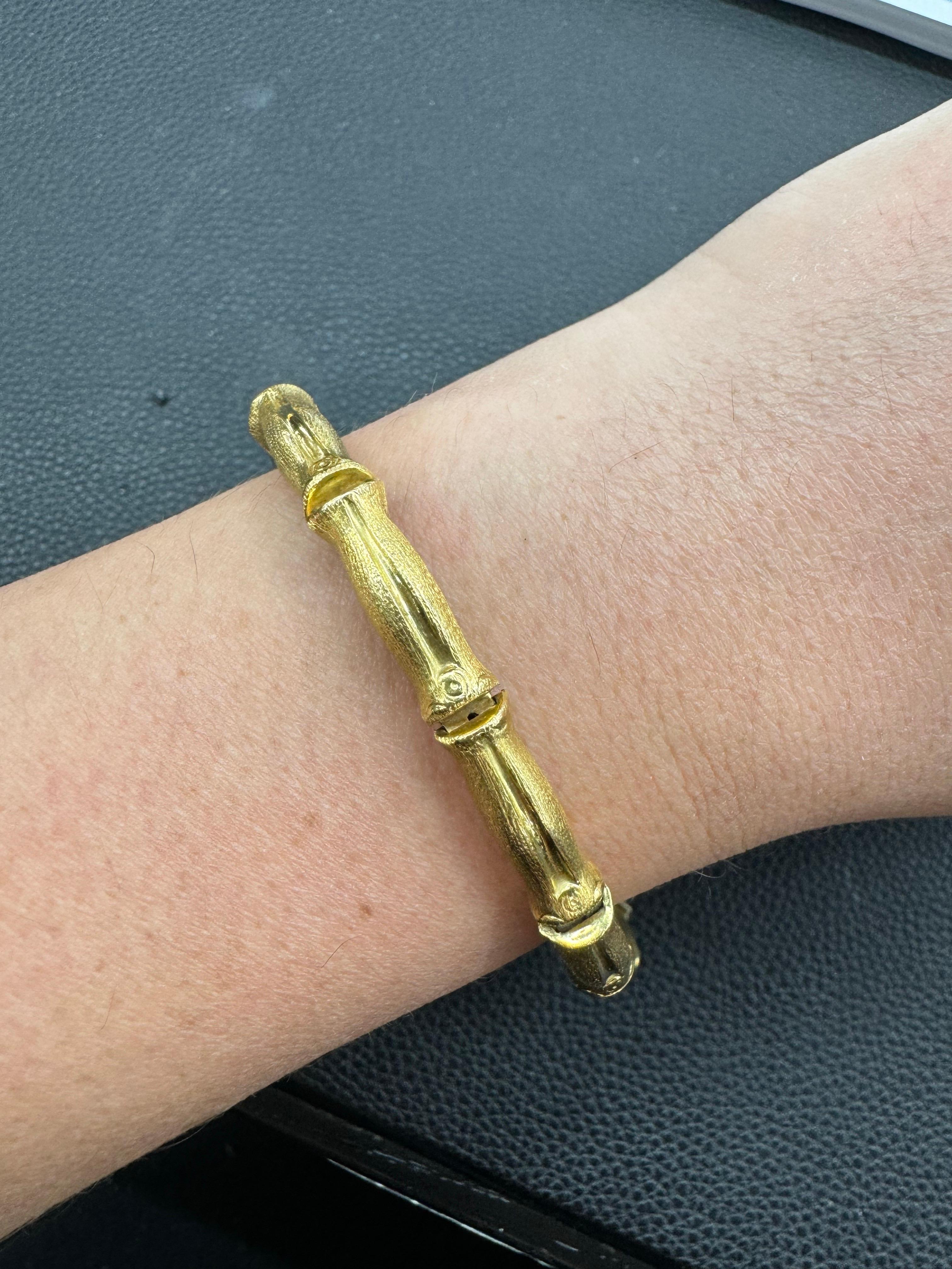 18 Karat yellow gold link bracelet featuring a Bamboo link motif in a brushed finished, 17.3 grams. 