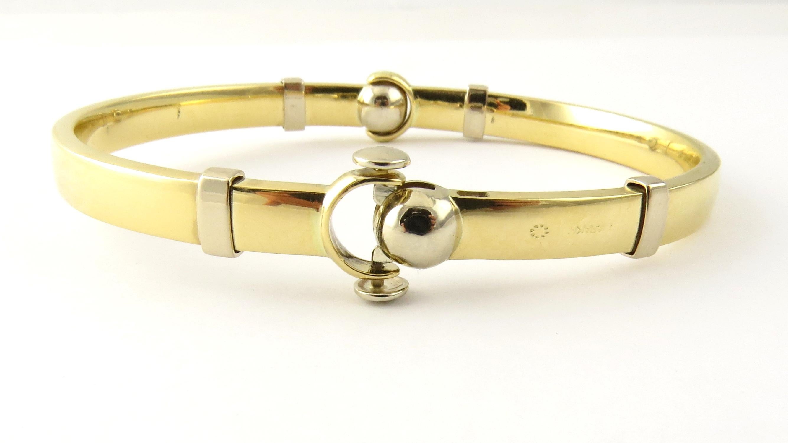 Vintage 18 Karat Yellow Gold Bangle Bracelet

This elegant hinged bangle bracelet is meticulously crafted in classic 18K yellow gold. Width: 8 mm.

Size: 7.5 inches

Weight: 13.9 dwt. / 21.7 gr.

Stamped: 750

Very good condition, professionally