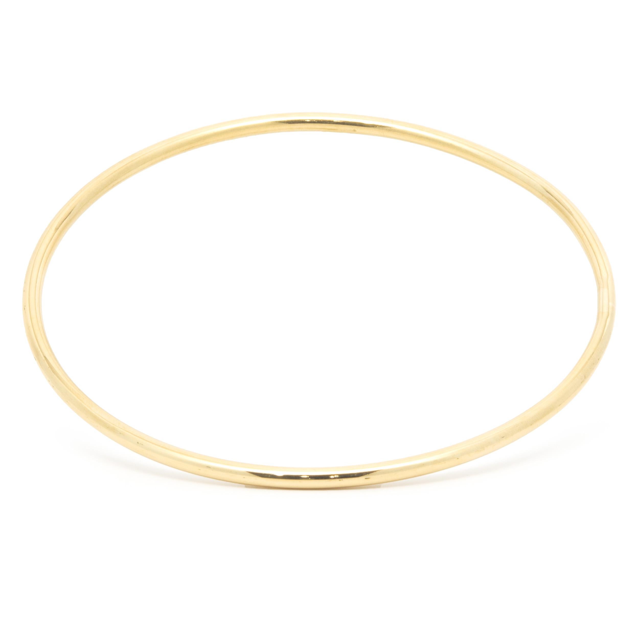 Material: 18K yellow gold
Dimensions: bracelet will fit up to a 7-inch wrist
Weight: 14.77 grams