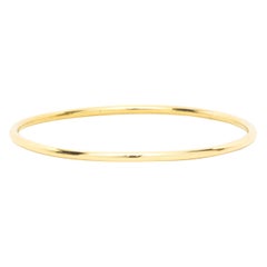 Pulsera brazalete de oro amarillo de 18 quilates
