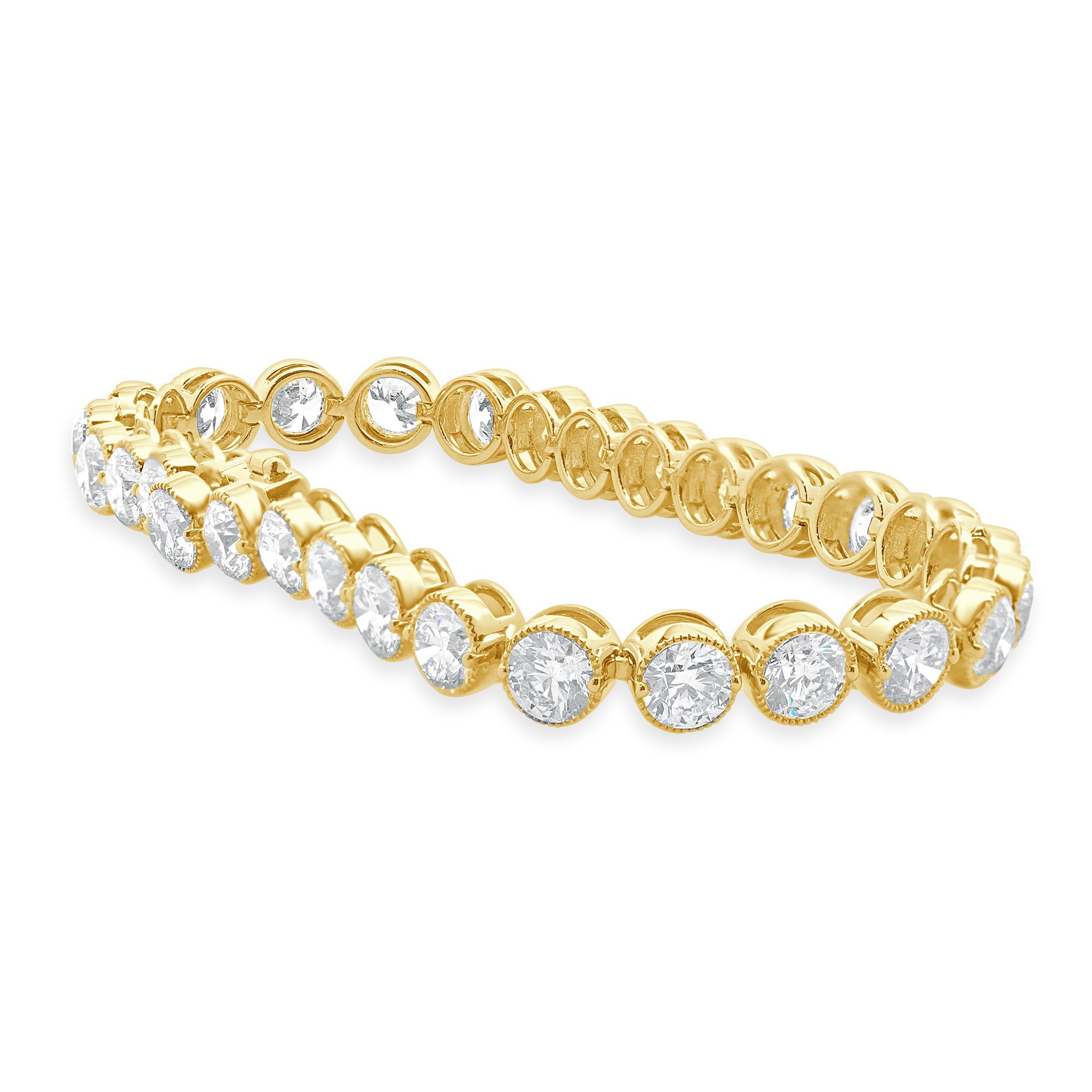 Designer: custom design
Material: 18K yellow gold
Diamond: 29 round brilliant = 14.80cttw
Color: H
Clarity: SI1
Dimensions: bracelet will fit up to a 7-inch wrist
Weight: 20.68 grams
