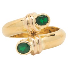 18 Karat Yellow Gold Bezel Set Emerald Bypass Ring
