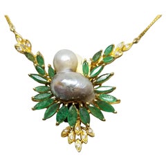 18 Karat Yellow Gold "Bird" Shaped Pearl with Emeralds and Diamonds Pendant