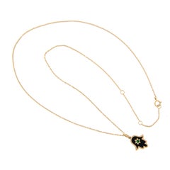 18 Karat Yellow Gold Black Onyx and Emerald Hamsa Necklace
